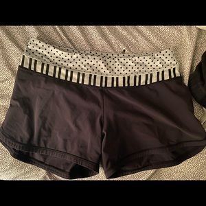 Black lululemon shorts with white and black stripped and polkadot band!